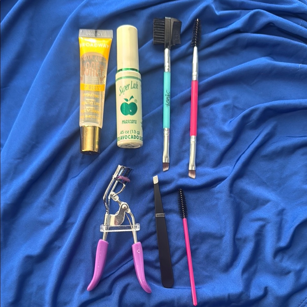 Makeup Tool and Cosmetic Set with Purple and Pink Accents